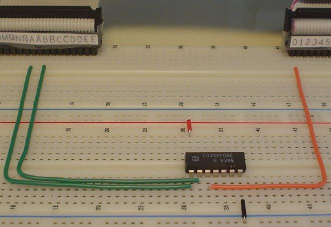 Breadboard setup to test one AND gate